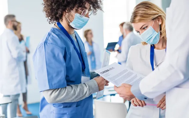 A group of doctors in discussion